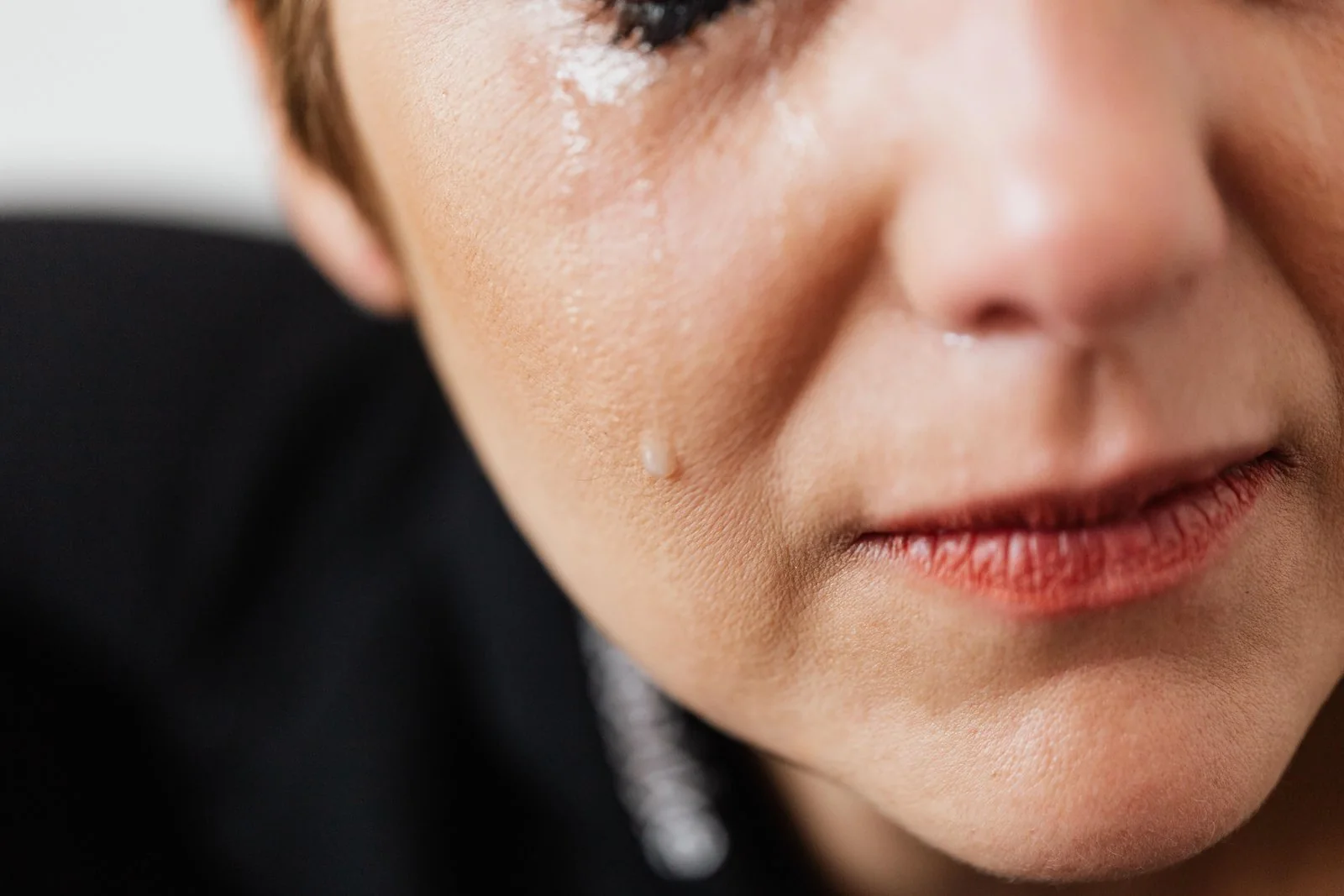 A grieving older woman